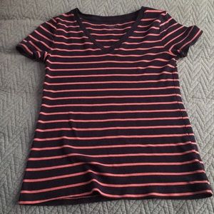 I am selling a Striped navy blue and pink shirt